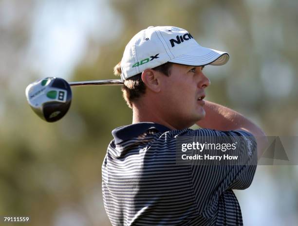 Jeff Quinney watches his tee shot on the third hole during the third round of the 49th Bob Hope Chrysler Classic at the Classic Club on January 18,...