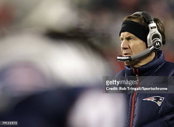 Bill Belichick head coach of the New England Patriots looks on from the sidelines against the the Pittsburgh Steelers during their game on December...