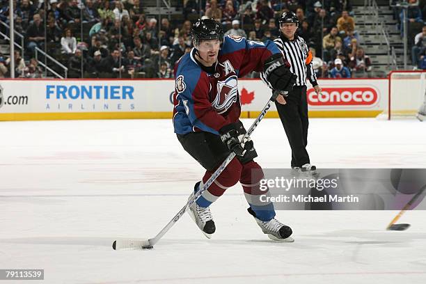 Milan Hejduk of the Colorado Avalanche skates with the puck against the Chicago Blackhawks at the Pepsi Center on January 18, 2008 in Denver,...