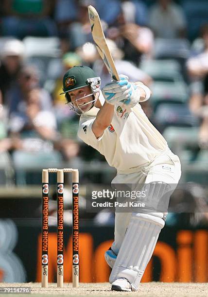 Michael Clarke of Australia drives during day four of the Third Test match between Australia and India at the WACA on January 19, 2008 in Perth,...