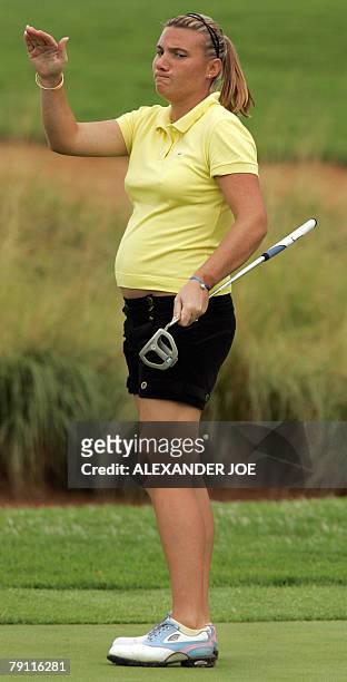 Virginie Lagoutte-Clement from France reacts to a bad shot on the 4th hole, 19 January 2008, during the 2nd day of the Women?s World Cup of Golf in...