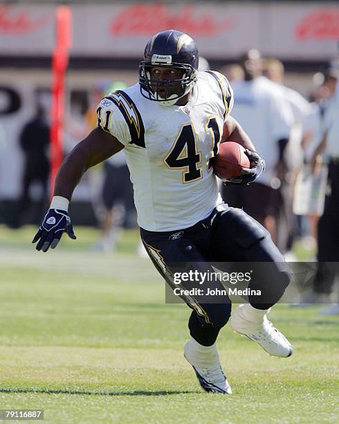 San Diego fullback Lorenzo Neal goes for yardage during the San Diego Chargers 27-14 defeat of the Oakland Raiders October 16, 2005 at McAfee...