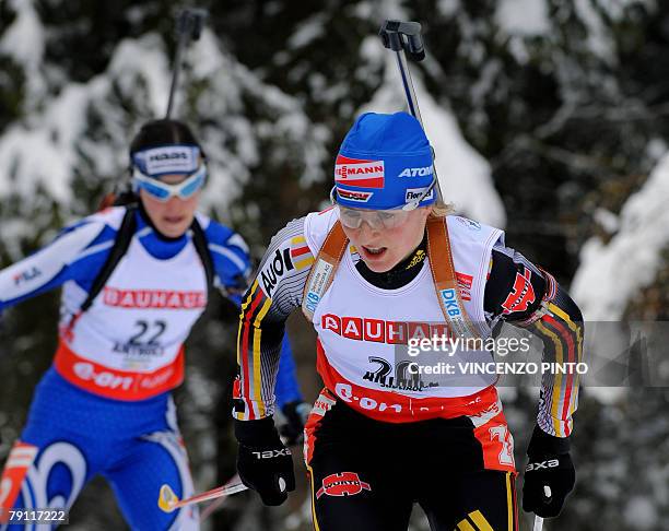 German Martina Glagow skis followed by Italian Michela Ponza during the women's World Cup biathlon 10 kms pursuit 19 January 2008 in Anterselva....