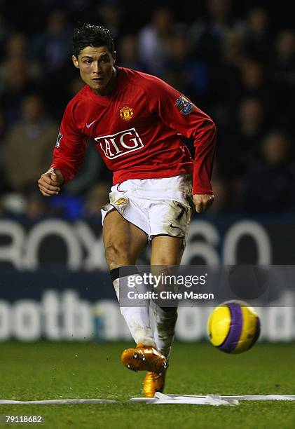 Cristiano Ronaldo of Manchester United scores United 2nd goal during the Barclays Premier League match between Reading and Manchester United at The...