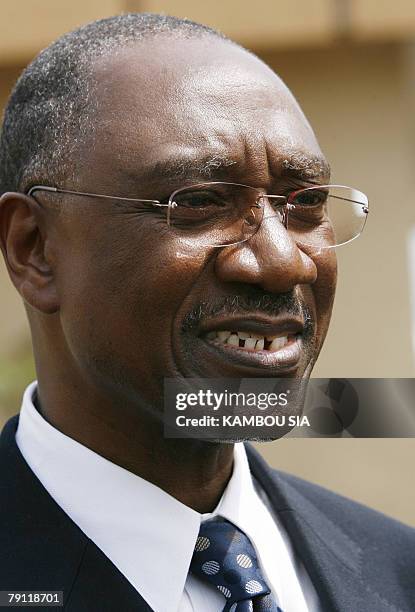 The new governor of the Central Bank of West African States , Ivorian Phillipe Henry Dacoury-Tabley waits to welcome Ivorian President Laurent Gbagbo...