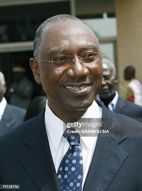 The new governor of the Central Bank of West African States , Ivorian Phillipe Henry Dacoury-Tabley waits to welcome Ivorian President Laurent Gbagbo...