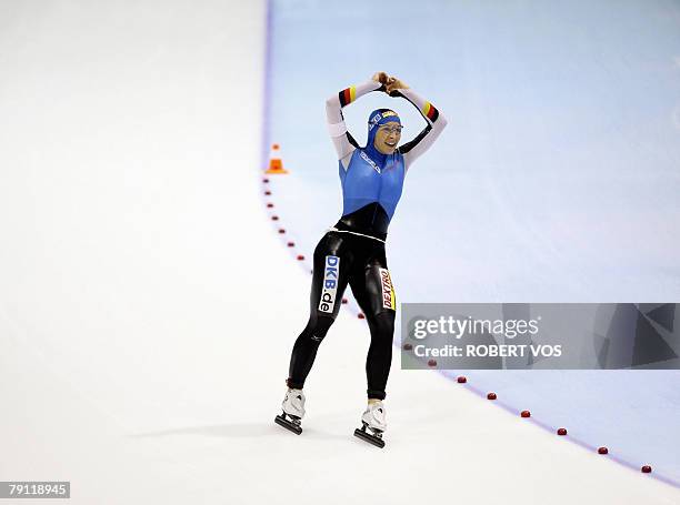 German Anni Friesinger celebrates 19 January 2008 after winning the 1,000-meter sprint on the first day of the ice skating world championship at...