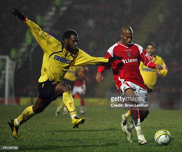 Nathan Ellington of Watford tackles Yassin Moutaouakil of Charlton Athletic uring the Coca-Cola Championship match between Watford and Charlton...