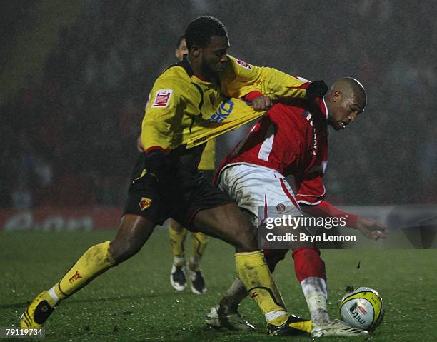 Nathan Ellington of Watford tackles Yassin Moutaouakil of Charlton Athletic uring the Coca-Cola Championship match between Watford and Charlton...