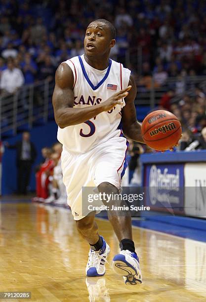 Rodrick Stewart of the Kansas Jayhawks dribbles downcourt during the game against the Miami Redhawks on December 22, 2007 at Allen Fieldhouse in...