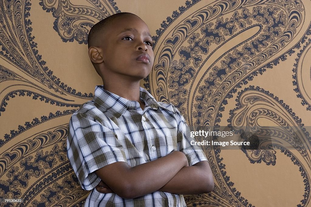 Boy with arms crossed