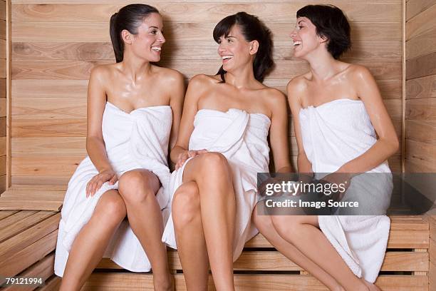 friends in a sauna - steam room stock pictures, royalty-free photos & images