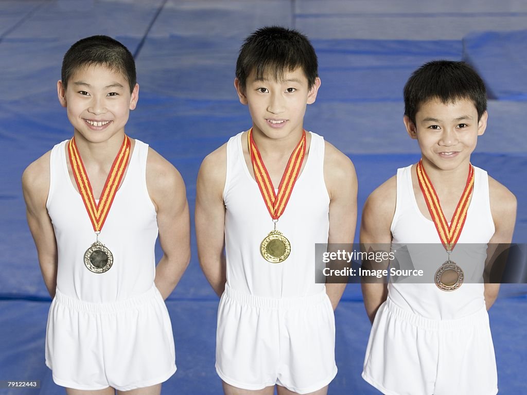 Young gymnasts with medals