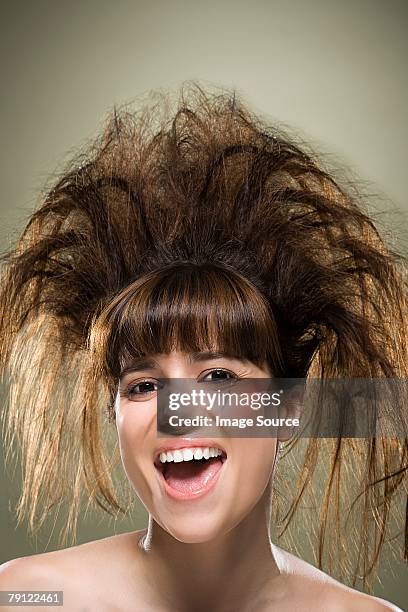 young woman with backcombed hair - getoupeerd stockfoto's en -beelden