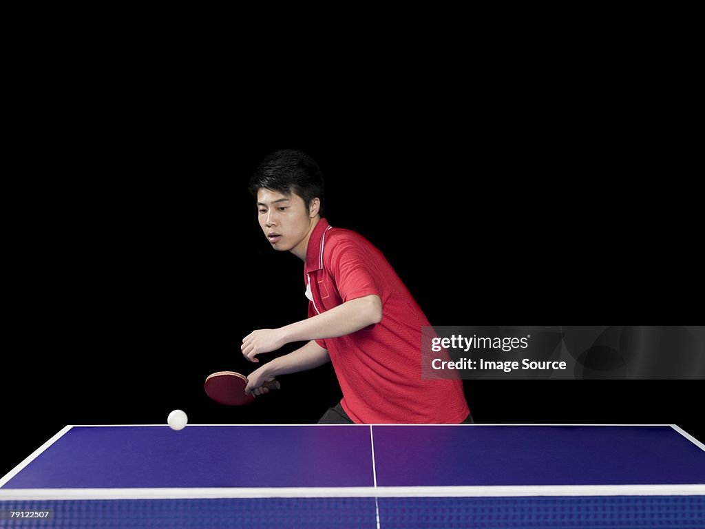 Man playing table tennis