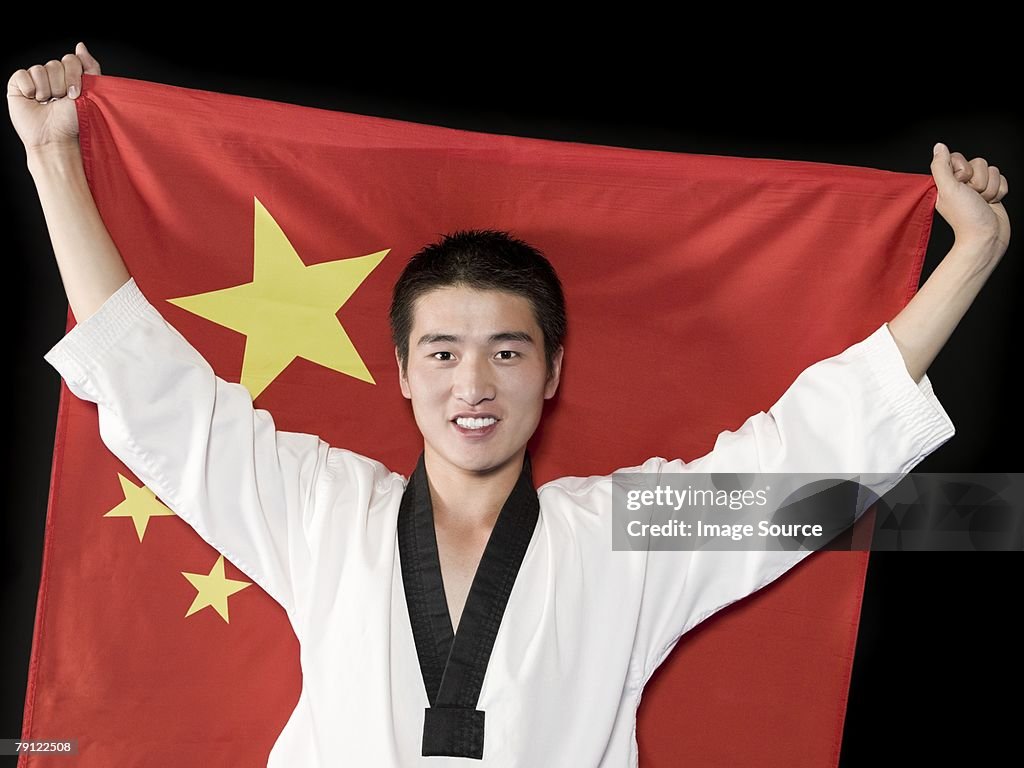 Martial artists with Chinese flag