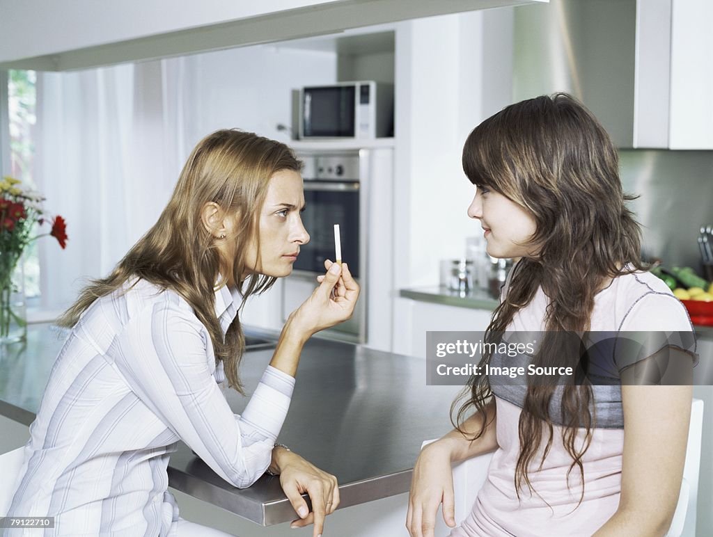 Girl and mother with cigarette