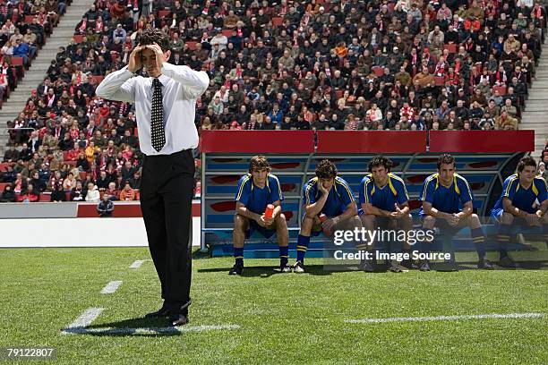 disappointed football manager - football bench stock pictures, royalty-free photos & images