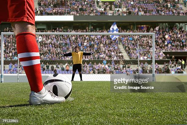 footballer about to take a penalty - goalie bildbanksfoton och bilder