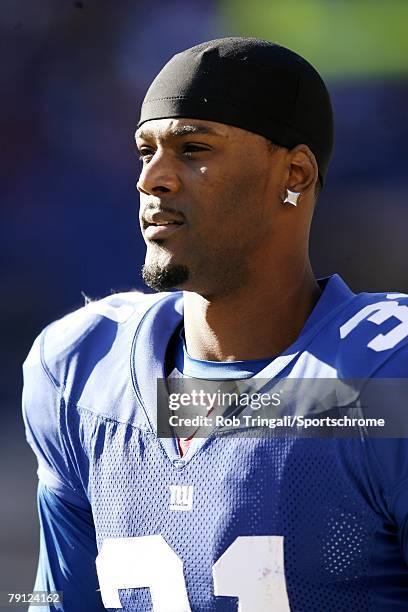 Aaron Ross of the New York Giants looks on against the Minnesota Vikings during their game at Giants Stadium on November 25, 2007 in East Rutherford,...