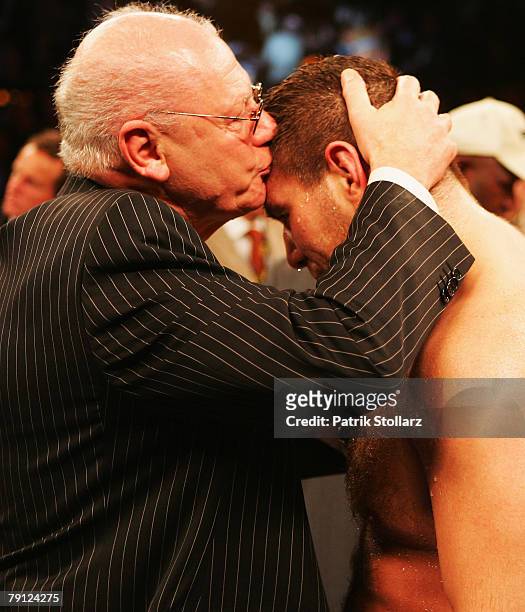 Boxing-Promoter Klaus-Peter Kohl kisses Russlan Chagaev of Uzbekistan after his WBA Commonwealth unification heavyweight championship fight against...