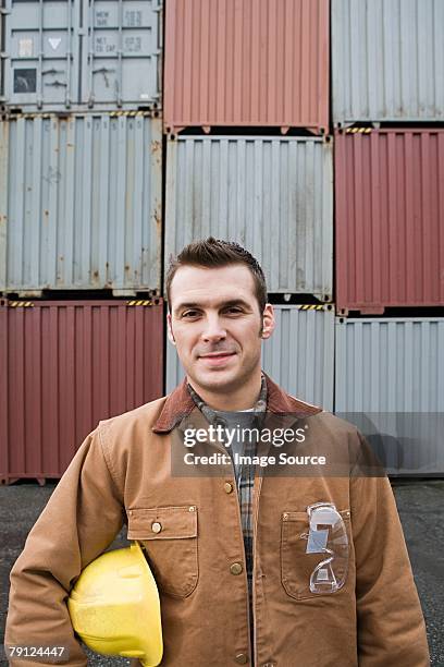 man at container terminal - jacket stock pictures, royalty-free photos & images