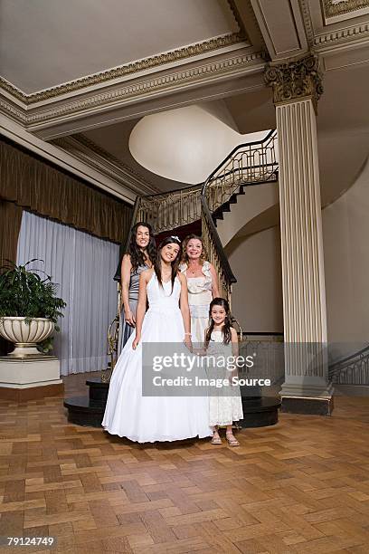 quinceanera with her female relations - quinceanera party stock pictures, royalty-free photos & images