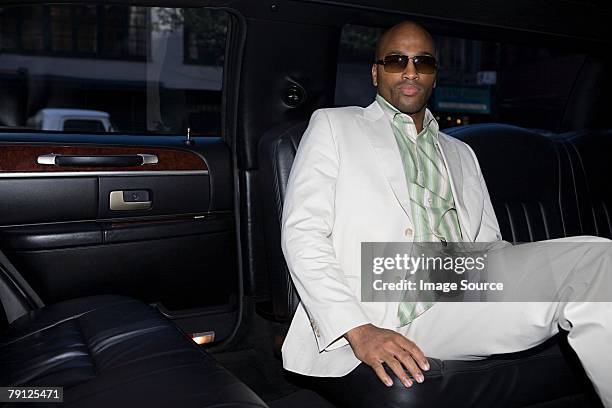 stylish man in a limo - male celebrity stock pictures, royalty-free photos & images