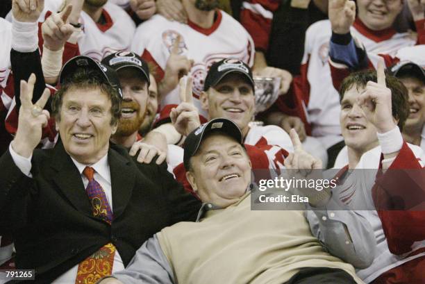 Owner Mike Ilitch Head Coach Scotty Bowman Luc Robitaille and the rest of the Detroit Red Wings take a team photo while celebrating winning the...