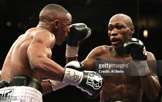 DeMarcus Corley lands a right hand against Devon Alexander during their WBC Continental Super Welterweight Championship bout at Madison Square Garden...