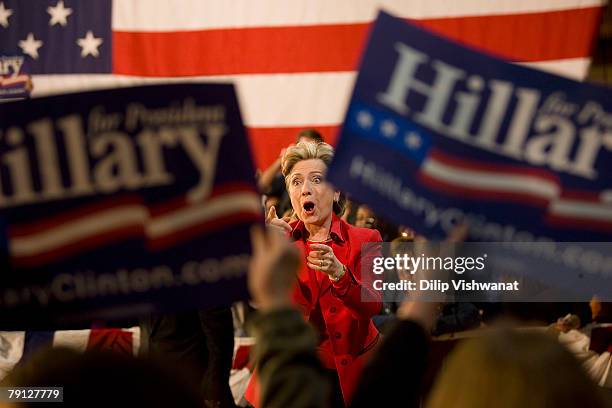 Democratic presidential hopeful Sen. Hillary Clinton acknowledges the crowd at a town hall meeting following the Nevada caucus at McCluer North High...