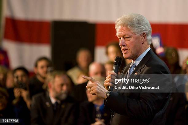 Former President Bill Clinton acknowledges the crowd prior to his wife Democratic presidential hopeful Sen. Hillary Clinton speaking at a town hall...