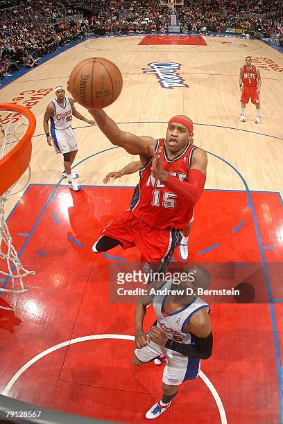 Vince Carter of the New Jersey Nets goes up for a shot against Cuttino Mobley of the Los Angeles Clippers at Staples Center on January 19, 2008 in...