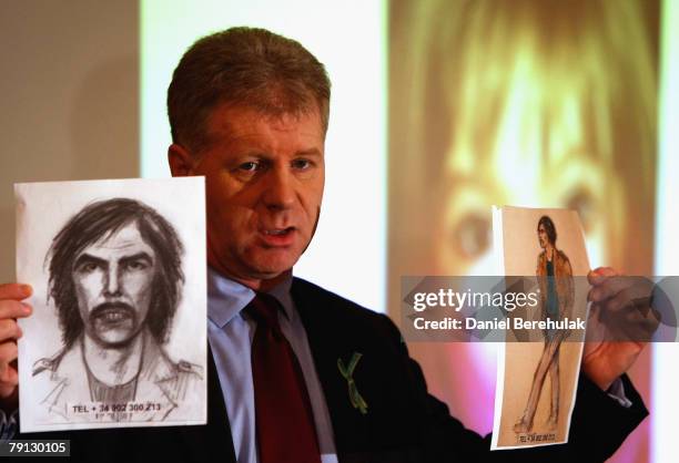 McCann family spokesman Clarence Mitchell holds two artist's impression of the new suspect on January 20, 2008 in London, England. The description...