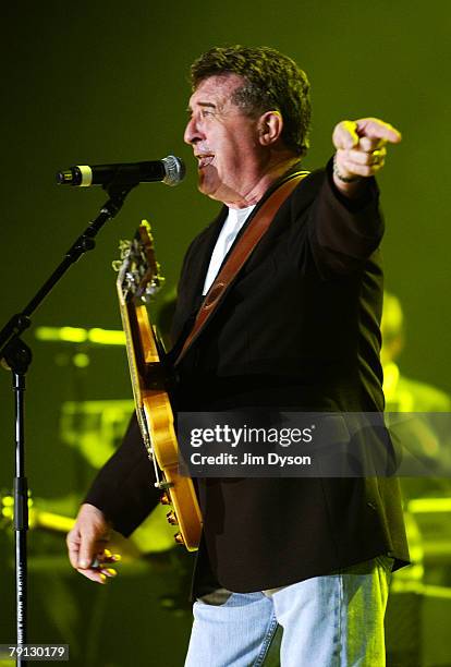 Ray Ennis of The Swinging Blue Jeans performs during the 'Number One Project' charity concert at the Echo Arena on January 19, 2008 in Liverpool,...