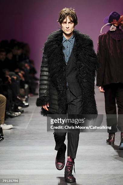 Model walks the runway during the Ann Demeulemeester Menswear fashion show part of Paris Fashion Week Fall/Winter 2008/2009 on the 19th of January...