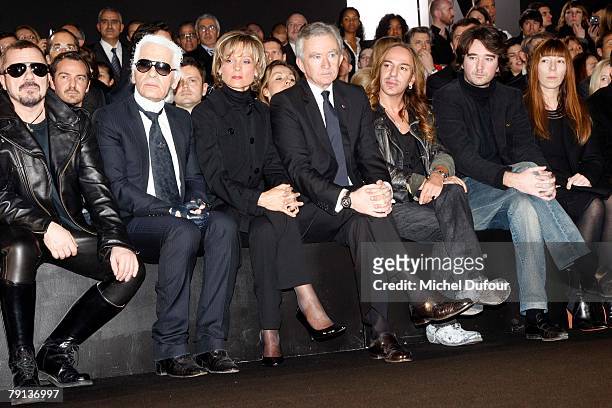 Front row, Peter Marino, Karl Lagerfeld, Mr and Mrs Bernard Arnault, John Galliano and Antoine Arnault attend the Dior Fashion show, during Paris...