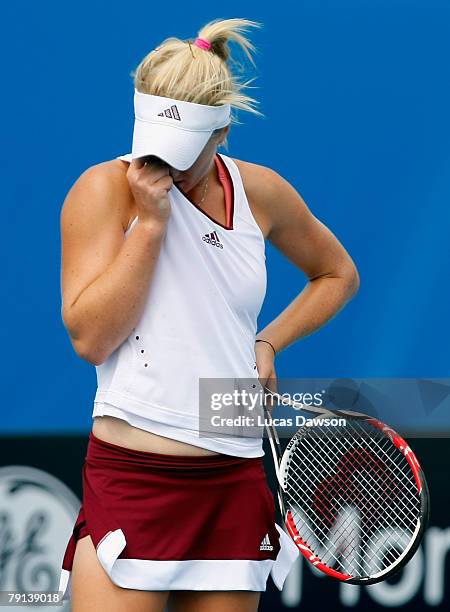 Isabella Holland of Australia reacts after a point during her junior girls match against Lesley Kerkhove of the Netherlands on day eight of the...