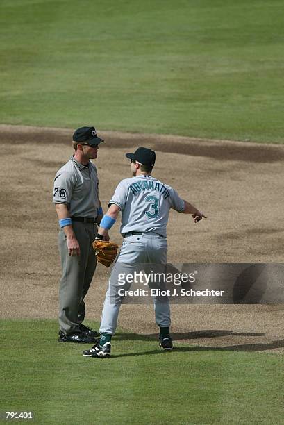 Second Baseman Brent Abernathy of the Tampa Bay Devil Rays argues the call with second base umpire Jim Wolf after second baseman Luis Castillo of the...