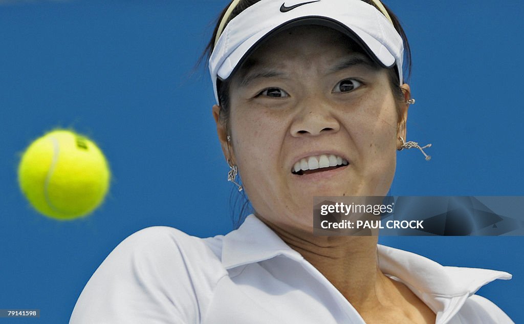 Li Na Ball Li Na of China eyes the ball while playing against Marta Domachowska ...