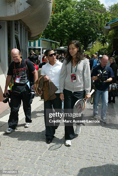 Ana Ivanovic with Chinese actor Aaron Kwok poses in the 'Village', the VIP area of the French Open at Roland Garros arena in Paris, France on June 1,...