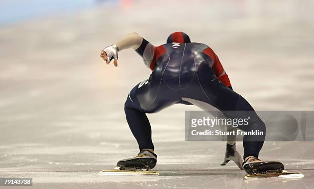 Speed skater takes an unusual stance at the start of a race during the first day of the World sprint speed skating Championships on January 19, 2008...