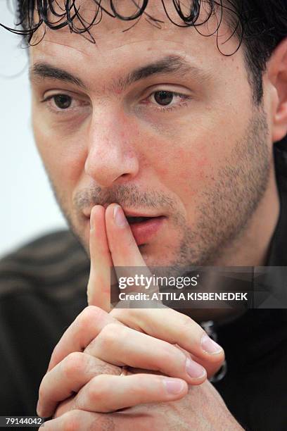 French player Jerome Fernandez listens to a journalist question in Trondheim, 21 January 2008 during a meeting of the French team for the press...