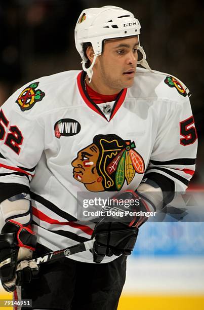 Dustin Byfuglien of the Chicago Blackhawks warms up prior to facing the Colorado Avalanche at the Pepsi Center on January 18, 2008 in Denver,...