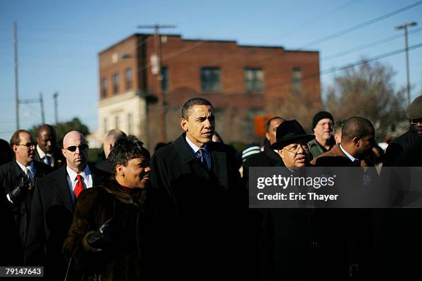 Presidential candidate U.S. Senator Barack Obama marches during a Martin Luther King Day rally at the state capitol January 21, 2008 in Columbia,...