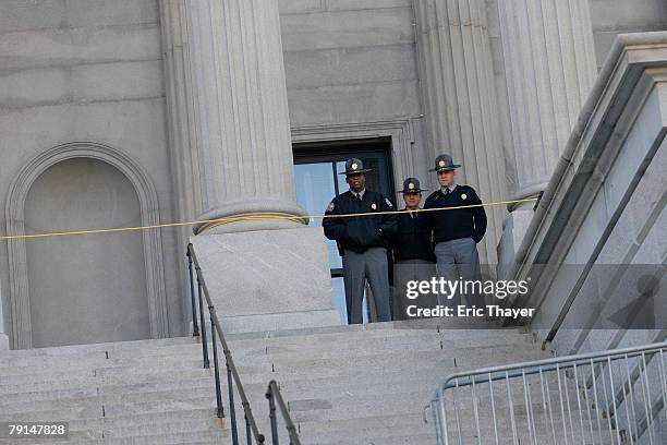 State troopers keep watch during a Martin Luther King Day rally at the state capitol January 21, 2008 in Columbia, South Carolina. Democratic...