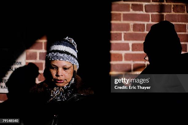 Women attends a Martin Luther King Day rally at the state capitol January 21, 2008 in Columbia, South Carolina. Democratic presidential candidates...