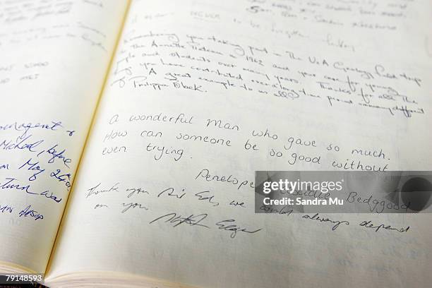 Mourners leave messages inside the book of remembrance prior to the State Funeral for Sir Edmund Hillary at St Marys Church on January 22, 2008 in...