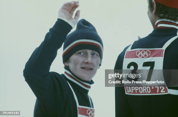 Polish ski jumper Wojciech Fortuna pictured waving to spectators after finishing in first place to win the gold medal for the Poland team in the...