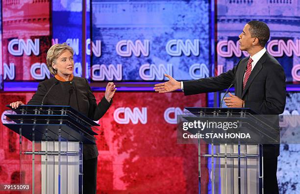 Democratic presidential hopeful New York Senator Hillary Rodham Clinton and Illinois Senator Barack Obama exchange comments during the Democratic...